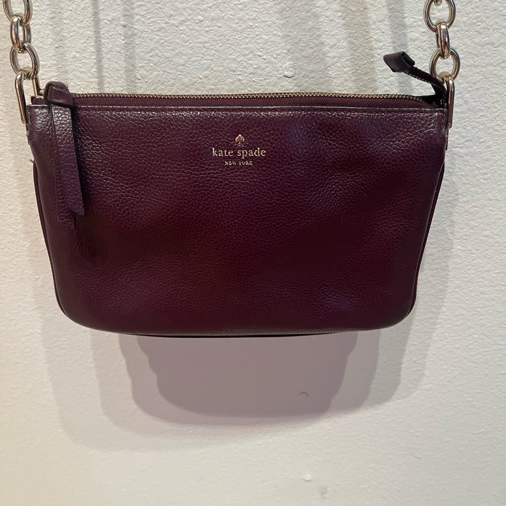 Kate Spade Plum Leather Crossbody Bag
6.5”x9.5” with shoulder strap